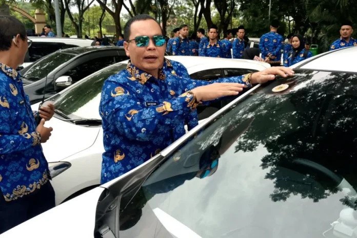 Stiker Pengingat Menempel, ASN Serang Diminta Segera Lunasi Pajak Kendaraan yang Nunggak